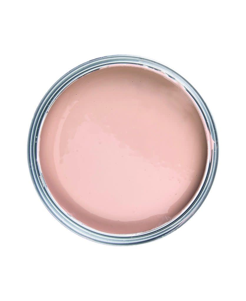 Overhead image of pale pink tin of paint