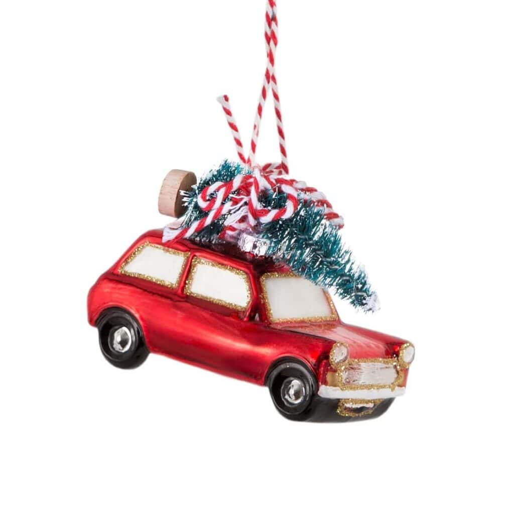 Christmas bauble shaped like a car with a Christmas tree on top