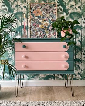 Chest of drawers painted in a pink and green paint effect
