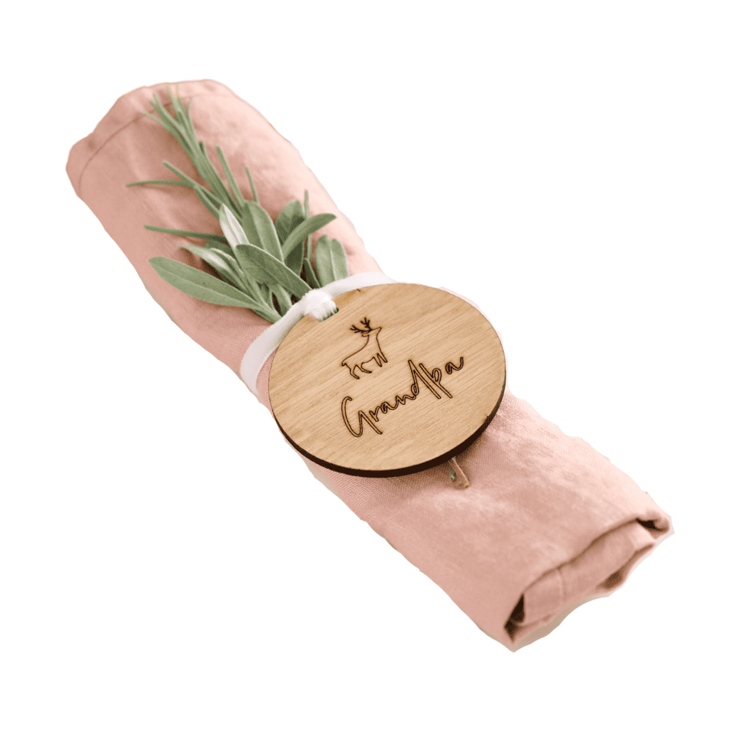 Pink linen napkin with personalised wooden place name